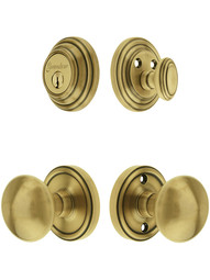 Grandeur Georgetown Entry Door Set, Keyed Alike with Fifth Avenue Knobs in Antique Brass.